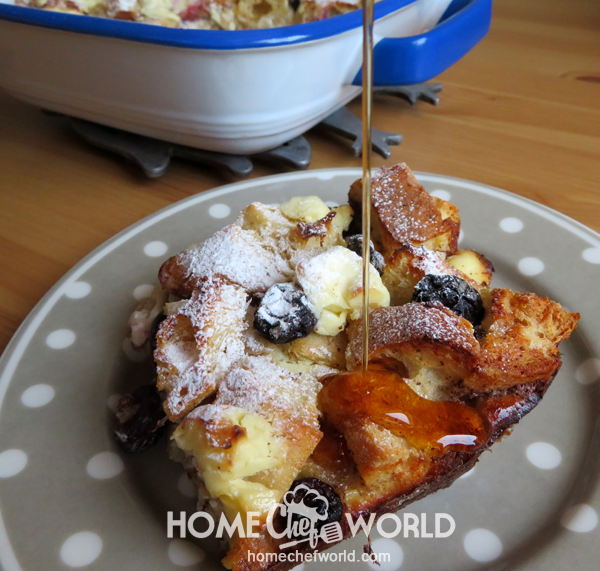 Pouring Syrup on French Toast Casserole With Cream Cheese