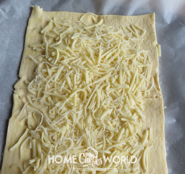 Cover Dough with Cheese