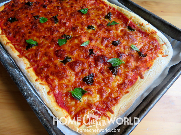 Quick and Easy Pizza Garnished with Fresh Basil