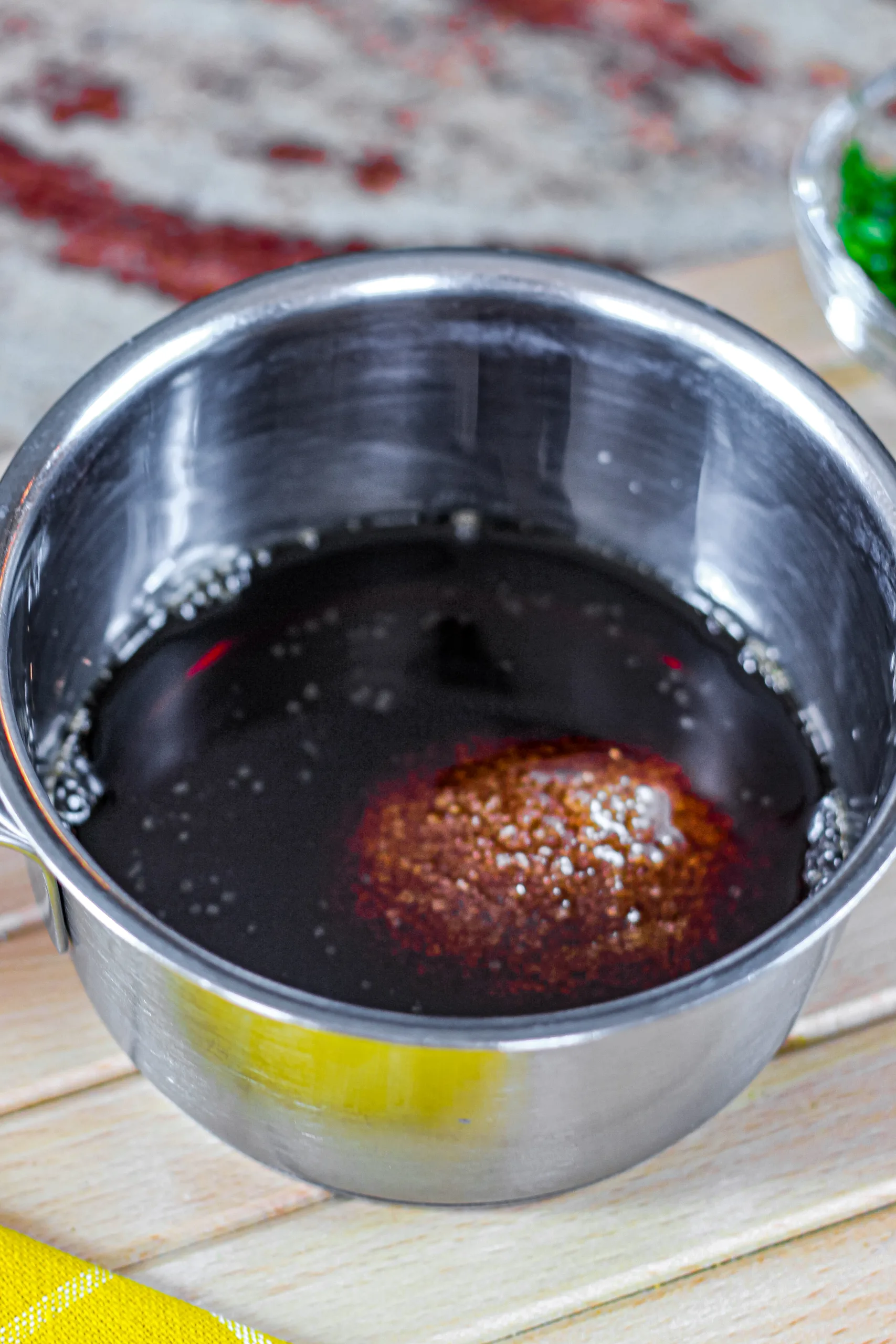 Pour one cup of balsamic vinegar into a pot over medium-high heat.